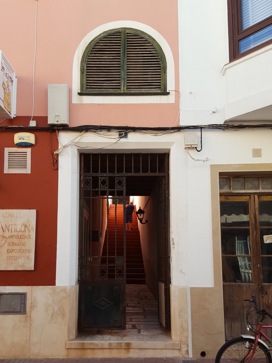 a colourful doorway in the streets of Ciutadella
