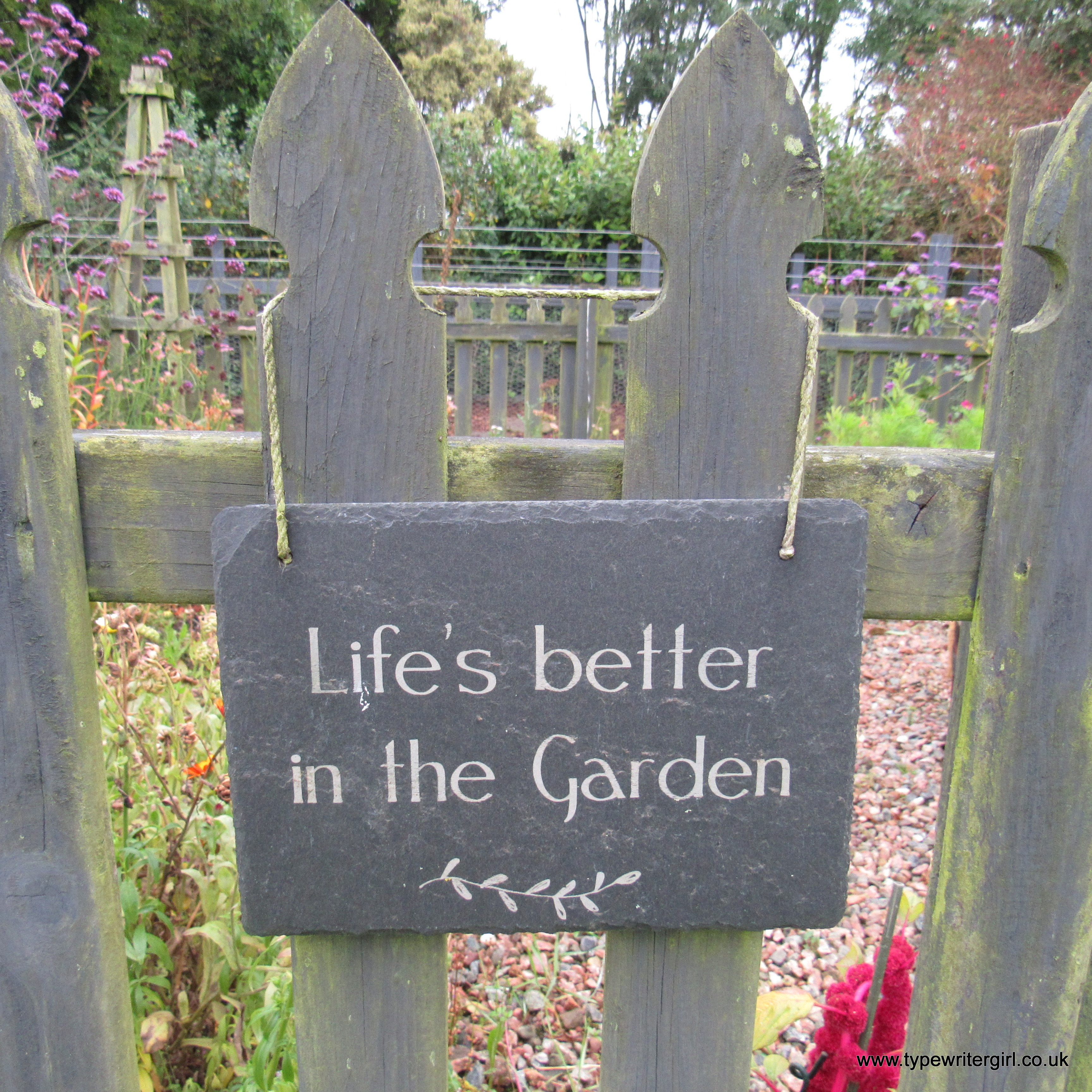 sign on a garden gate