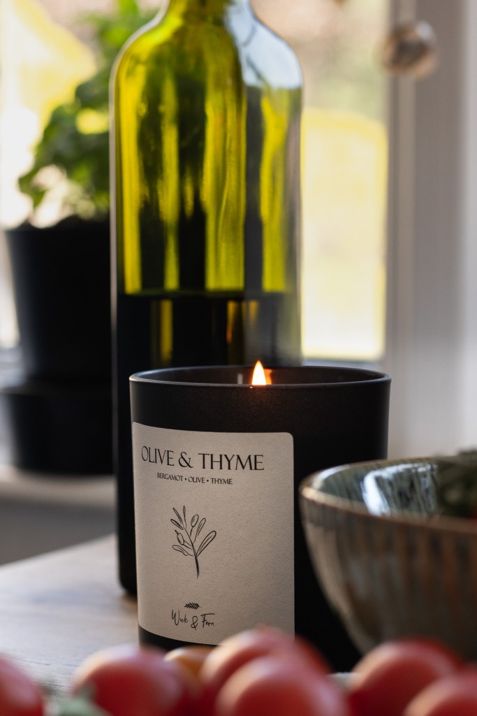 Close-up of a Wick and Fern botanical candle